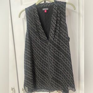 Vince Camuto sleeveless blouse featuring a black and white geometric print SizeL